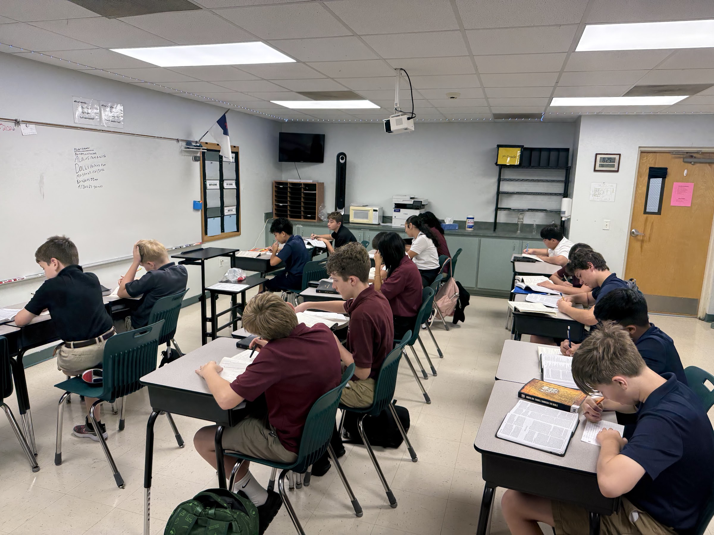 A BCA teacher working with students in class