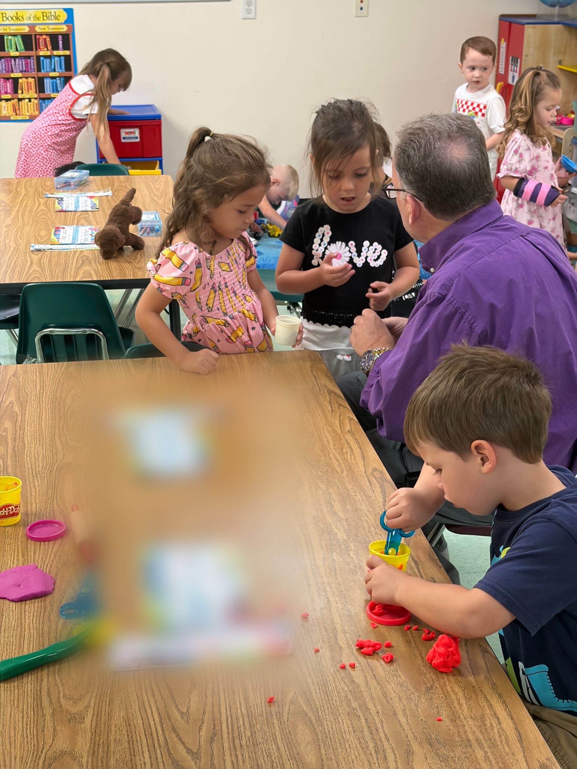 A BCA preschool class working together with their teacher
