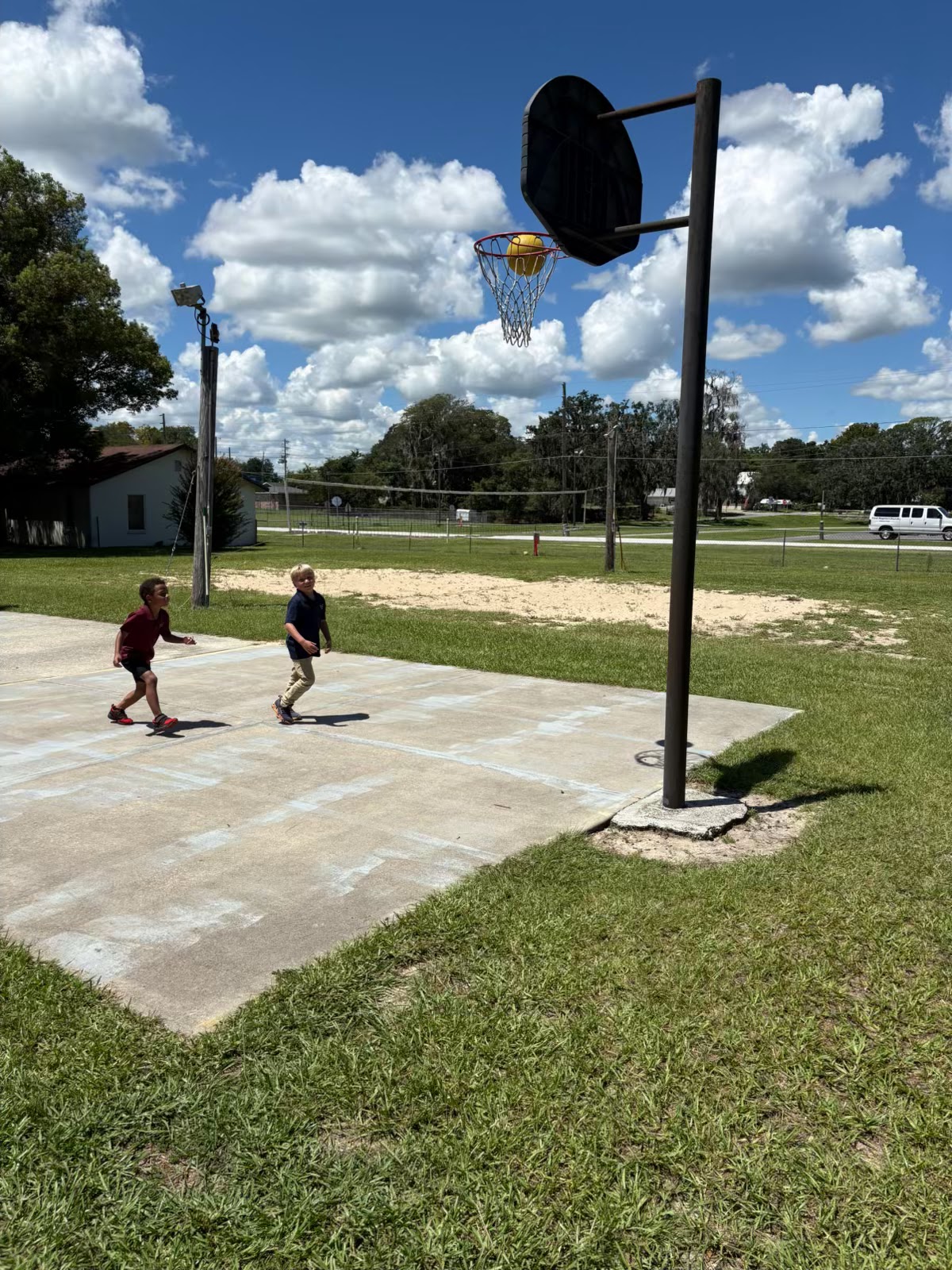 Students on the basketball court at BCA
