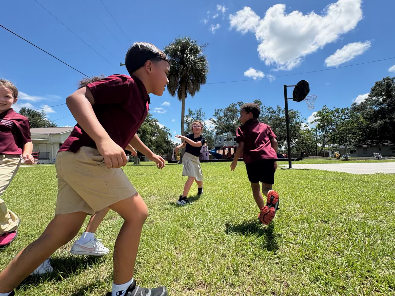 A BCA student running on the school field