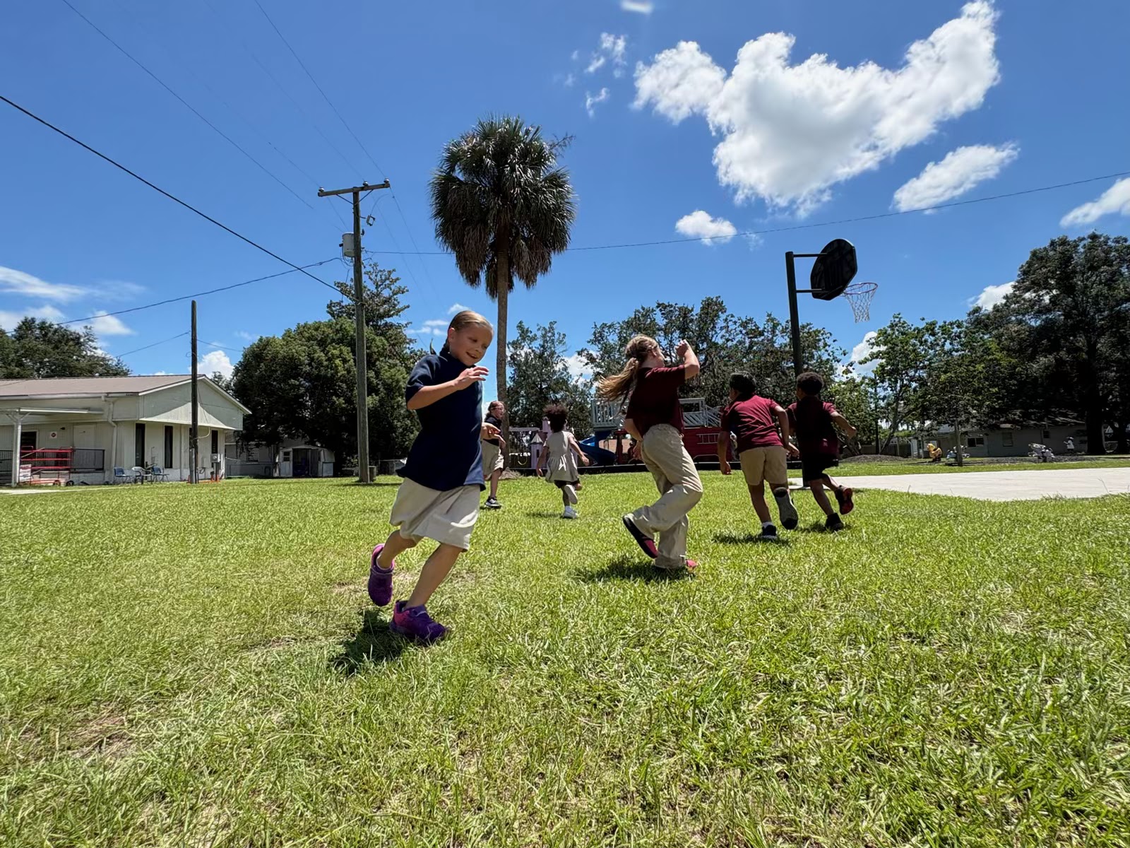 BCA students running on the school field